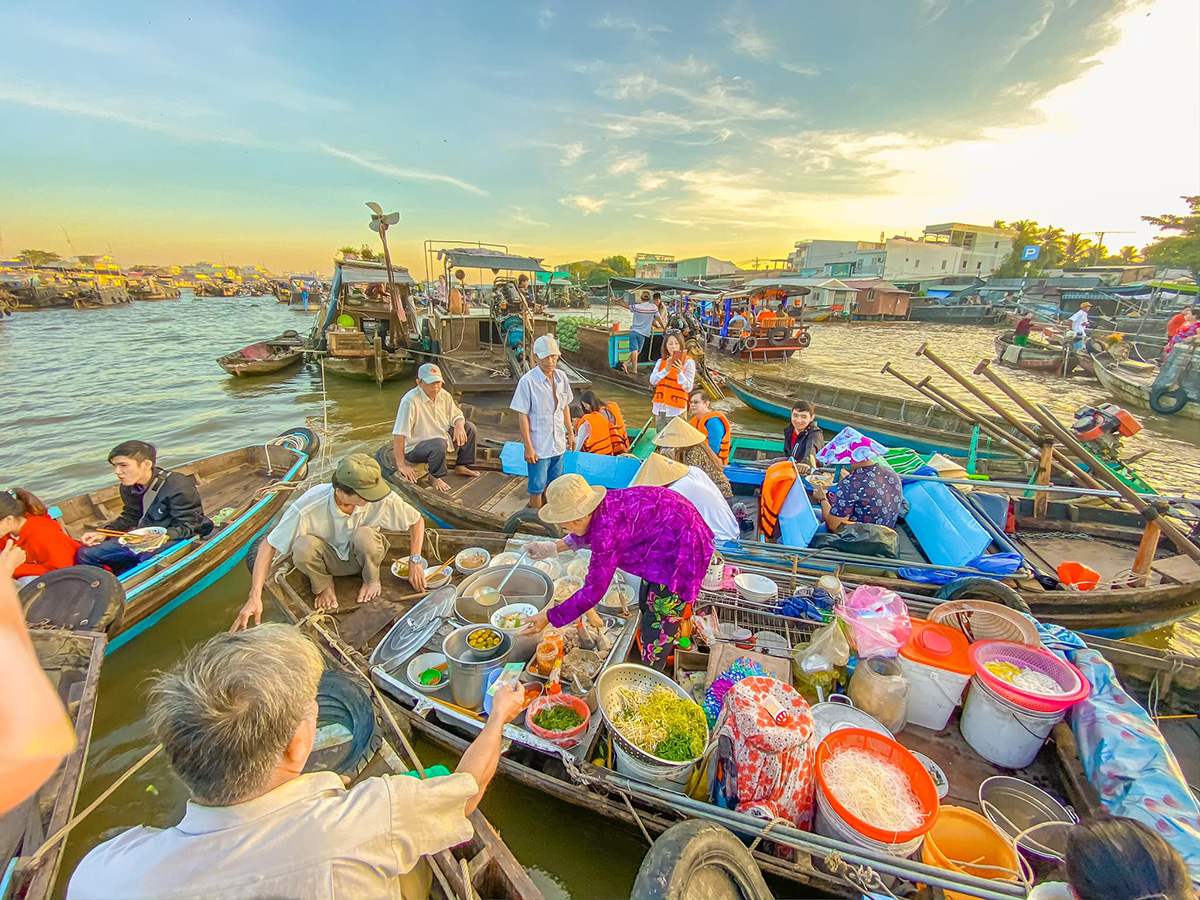 Visitors savor noodles right on the boat at Cai Rang