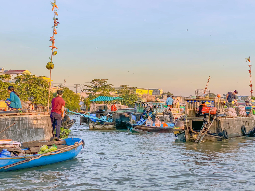 Selling produce on boats at Cai Rang market